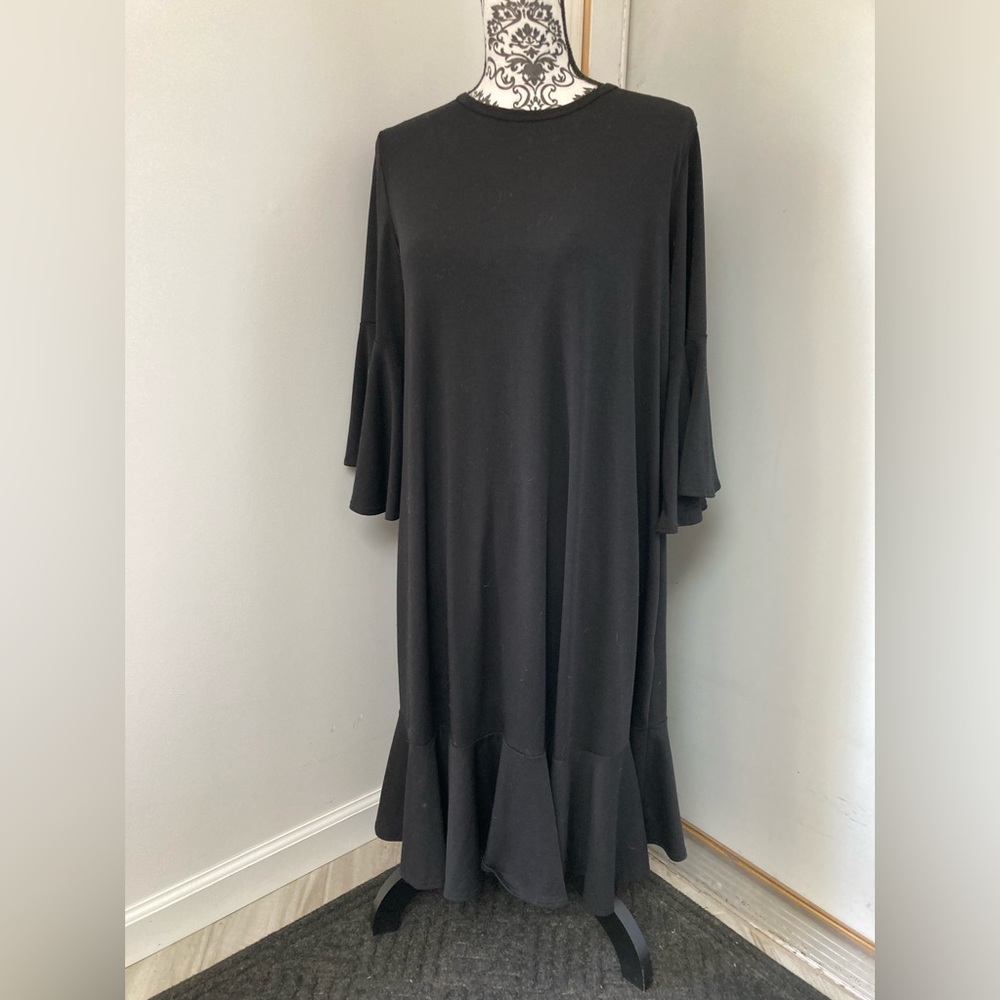 LulaRoe Maurine, Size L, 96% polyester, 4% spandex.  Solid black.  Not slinky.